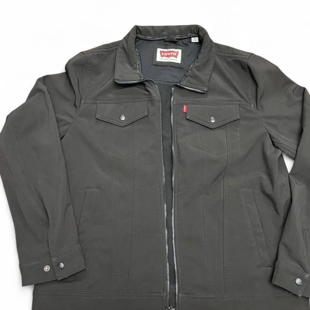 Levi's black soft shell jacket with snap button closure